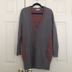 Orange and grey striped sweater